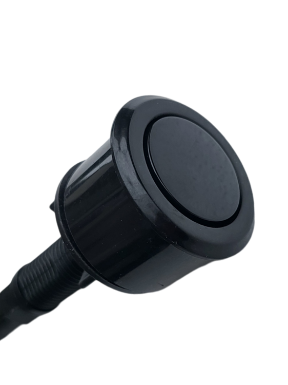 Nowoczesny, czarny automatyczny syfon przyścienny do jednokomorowego zlewozmywaka